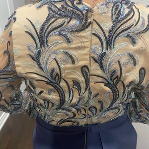 Custom made dress, size 6. Color blue and and beige with beads